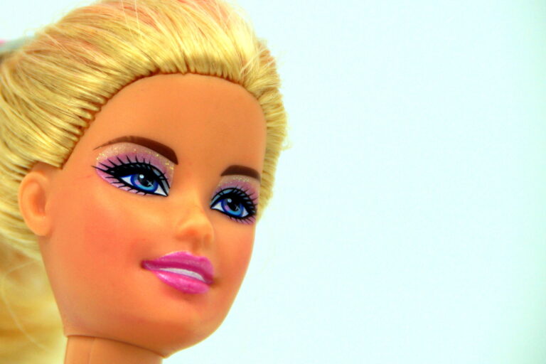 Portrait of the face of a blonde Barbie doll