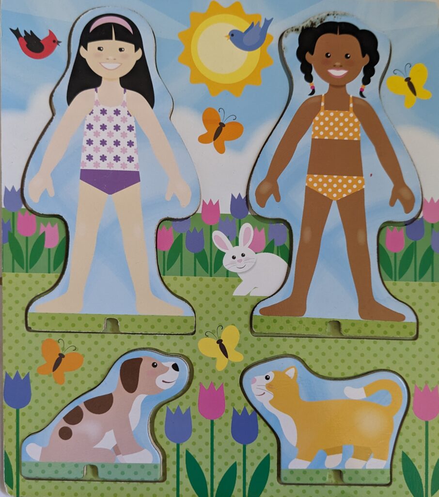 Melissa & Doug best friends magnetic dress-up play set showing the unclothed dolls on side B