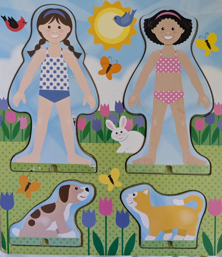 Melissa & Doug best friends magnetic dress-up play set showing the unclothed dolls on side A